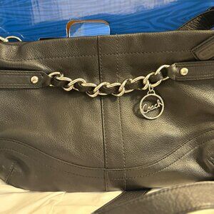 Coach purse with cute simple design, black with silver hardware.